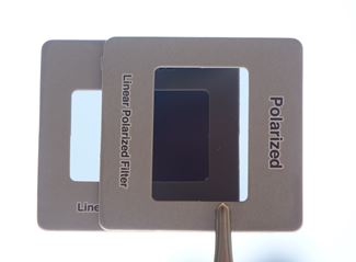 dos filtros de polarización a 90 grados entre sí